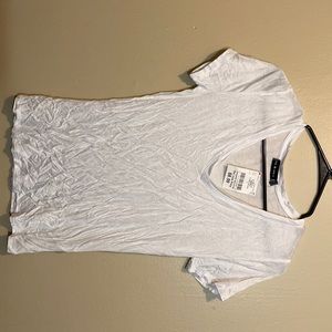 Brand New, never worn. Liz & Sara brand, loose-fitting white tee. Juniors Large.